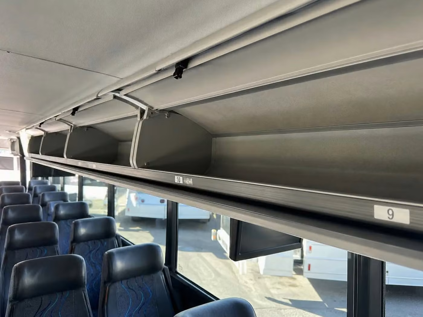 oviedo 18 passenger minibus overhead storage