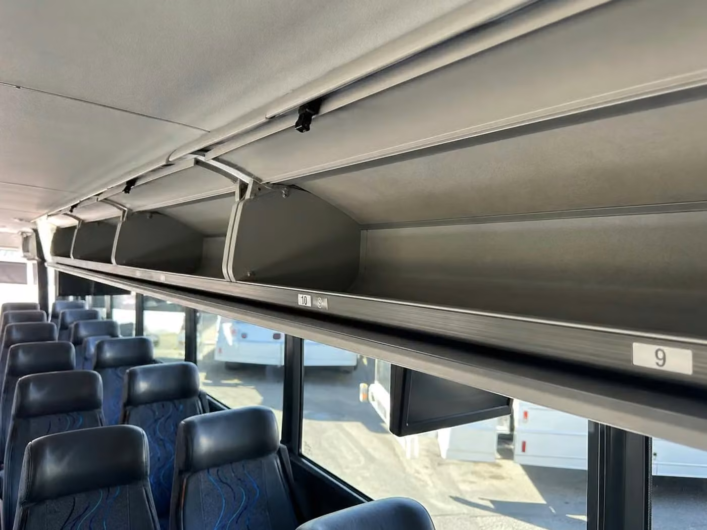 oviedo 28 passenger minibus overhead storage