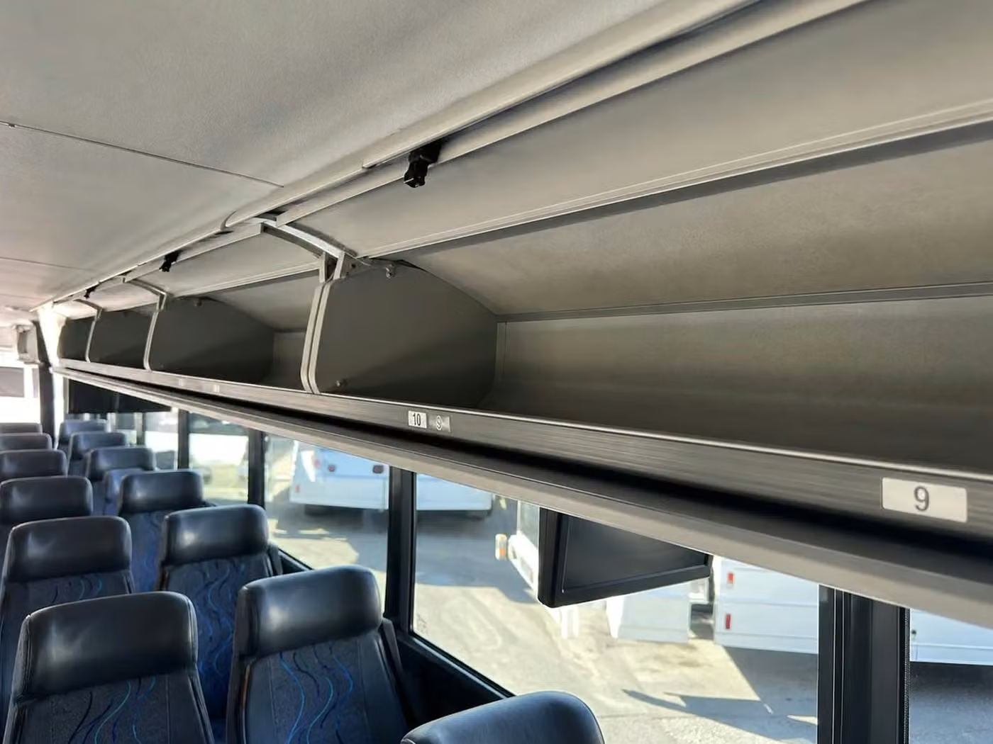 oviedo 35 passenger minibus overhead storage